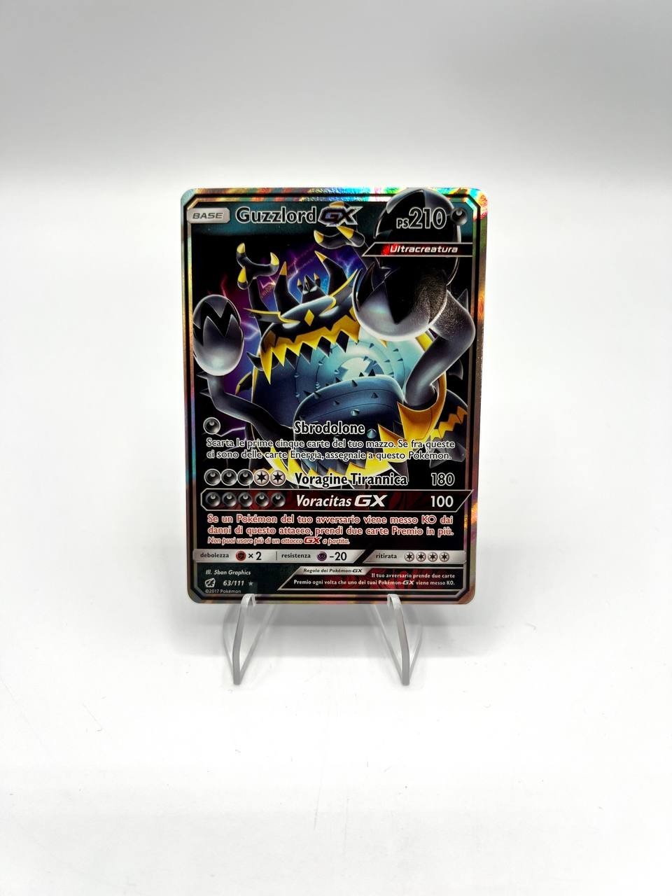 Carta pokemon GUZZLORD GX 63/111 HOLO set Invasione scarlatta Italiano Near mint
