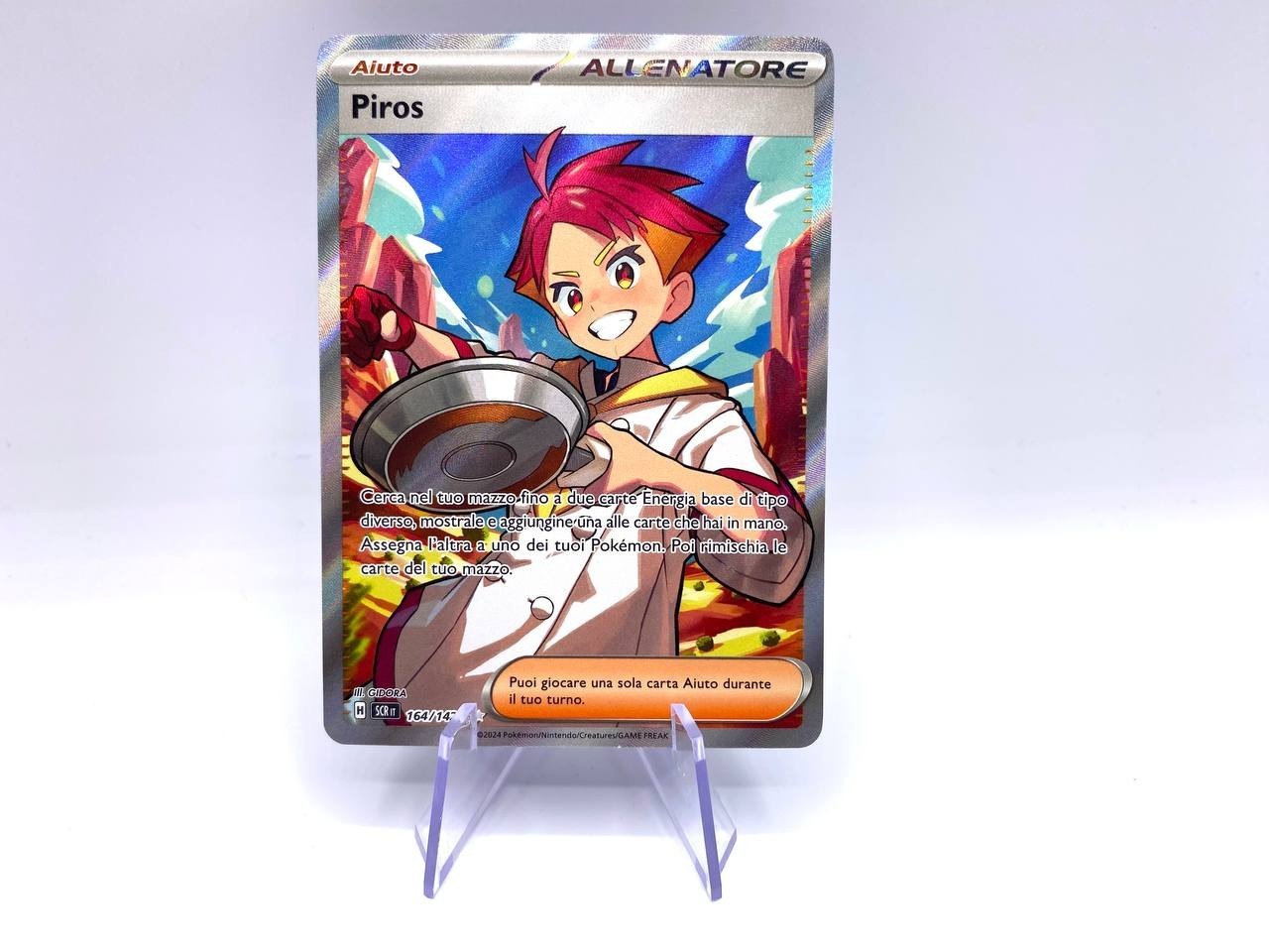 Carta Pokemon Allenatore 164-142 Piros Full Art SCR set Corona astrale ITA NM