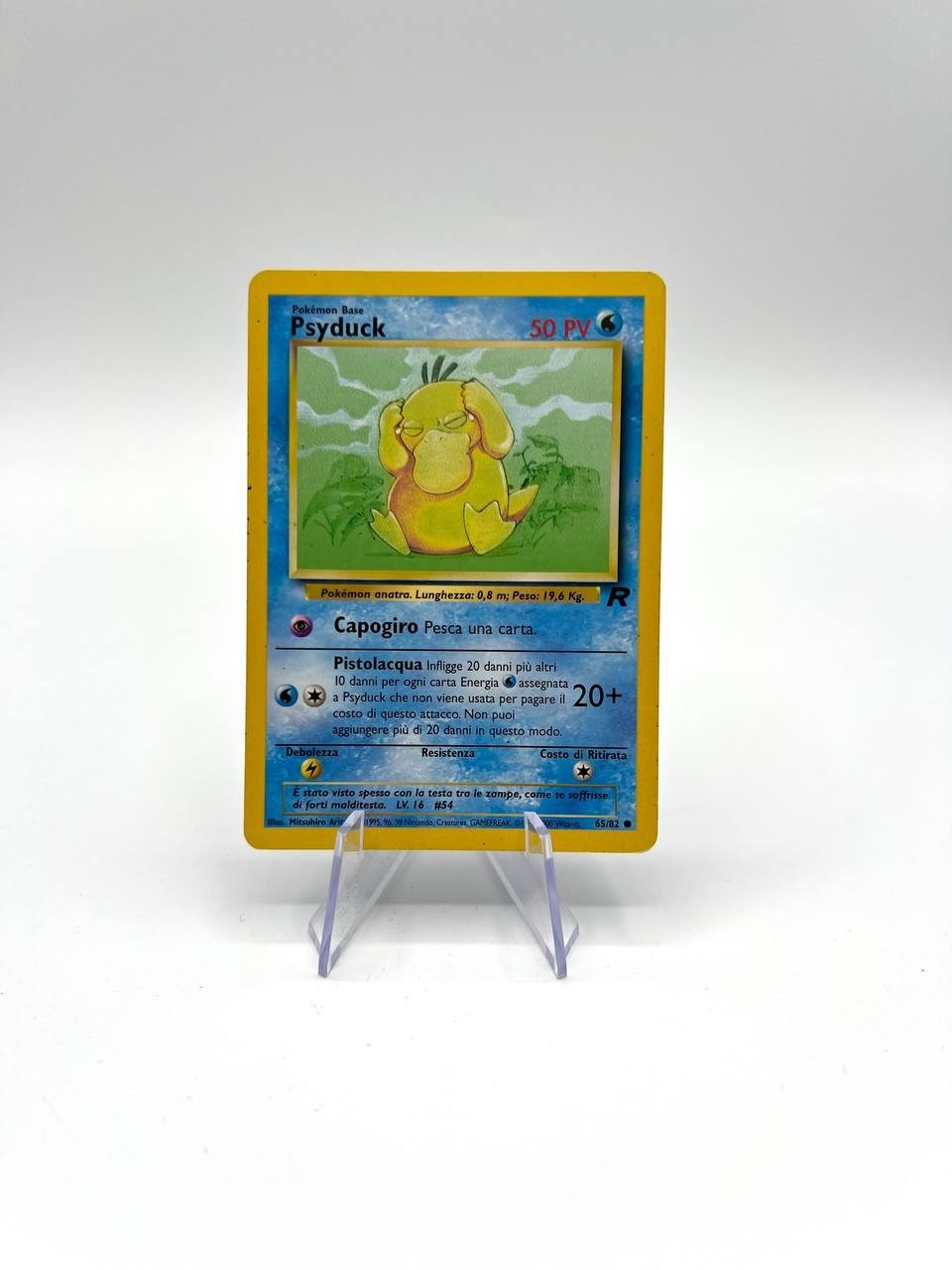 Carta pokemon Psyduck set Team Rocket 65/82 Vintage Poor Italiano no holo