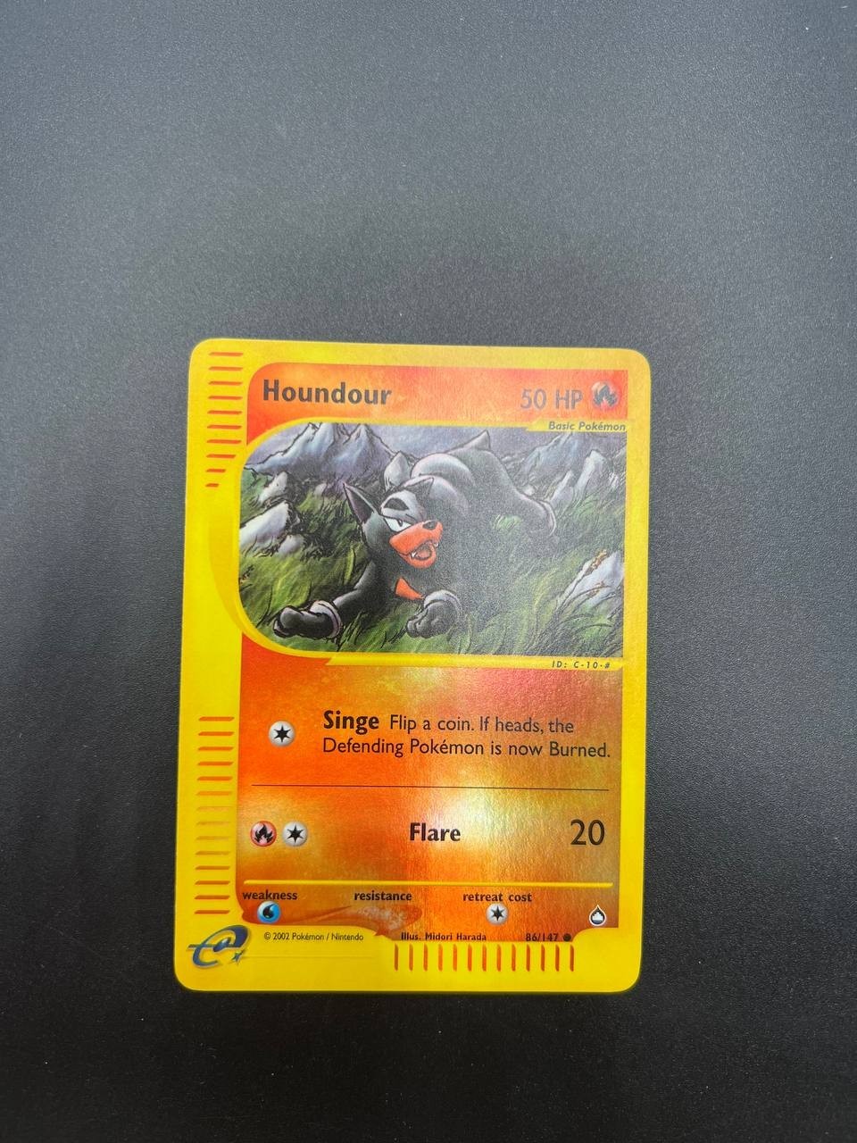Carta pokemon Houndour 86/147 set Aquapolis Inglese Vintage Holo reverse EXC