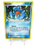carta pokemon Totodile 78/115 ex Unseen Forces Reverse Holo Stamped Inglese NM